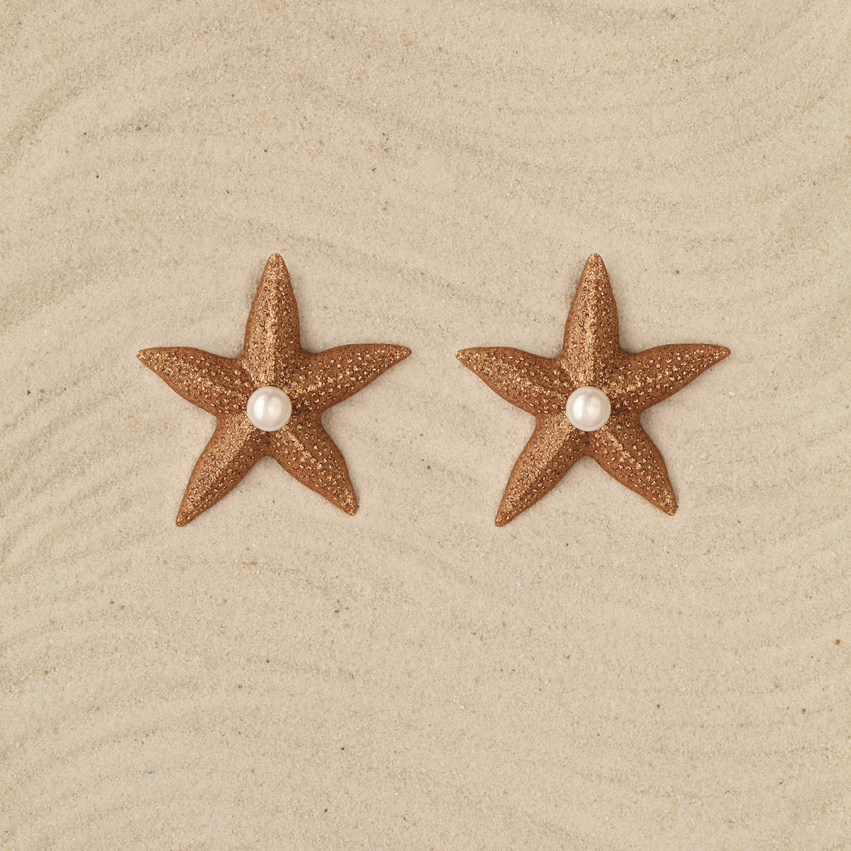 Aretes Estrellas doradas