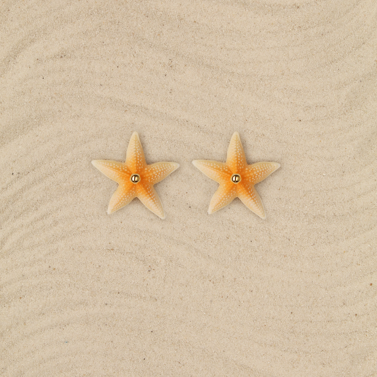 Aretes mini Estrellas naranja