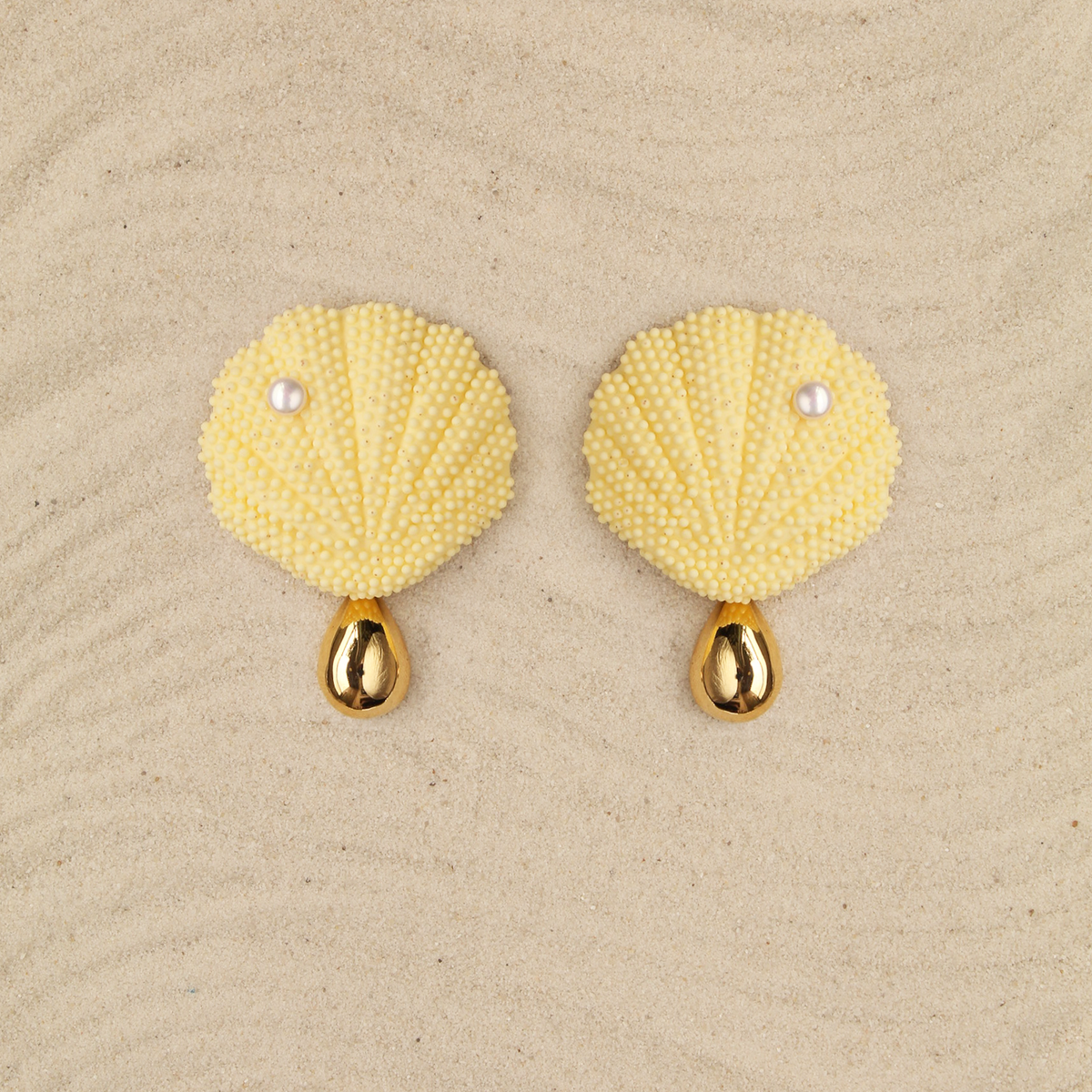 Aretes Ostras Sol
