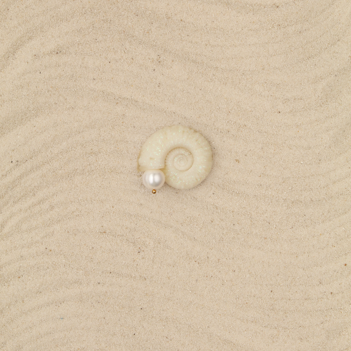 Earcuff Amonita tornasol
