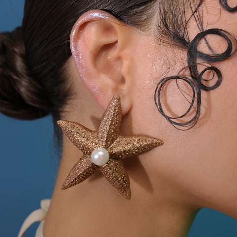 Aretes Estrellas doradas