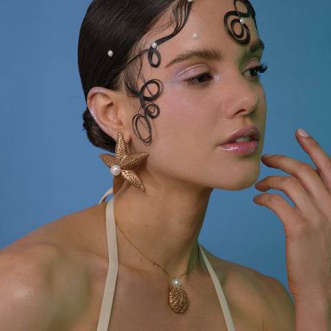 Aretes Estrellas doradas