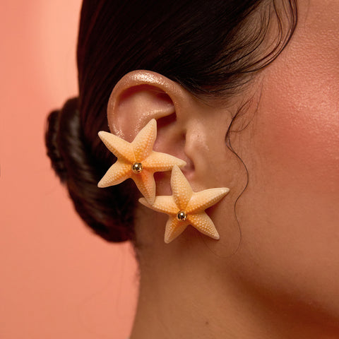 Aretes mini Estrellas naranja